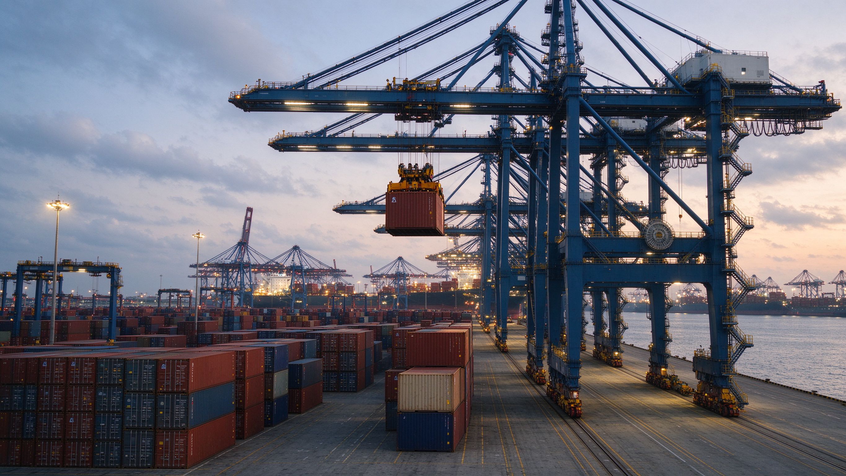Container terminal with crane and containers (illustrative concept image)