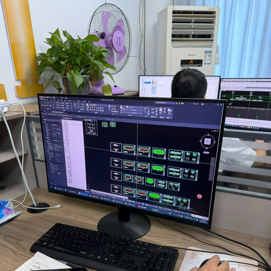 Design office workbench: engineer detailing and coordinating shop drawings from project drawings in CAD